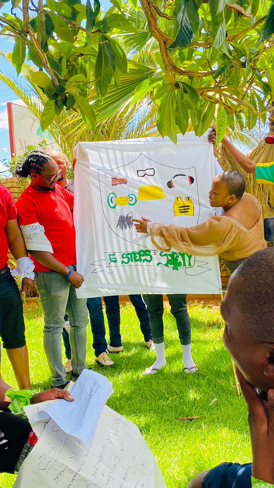 Community members participating in an African Eagle environmental awareness activity
