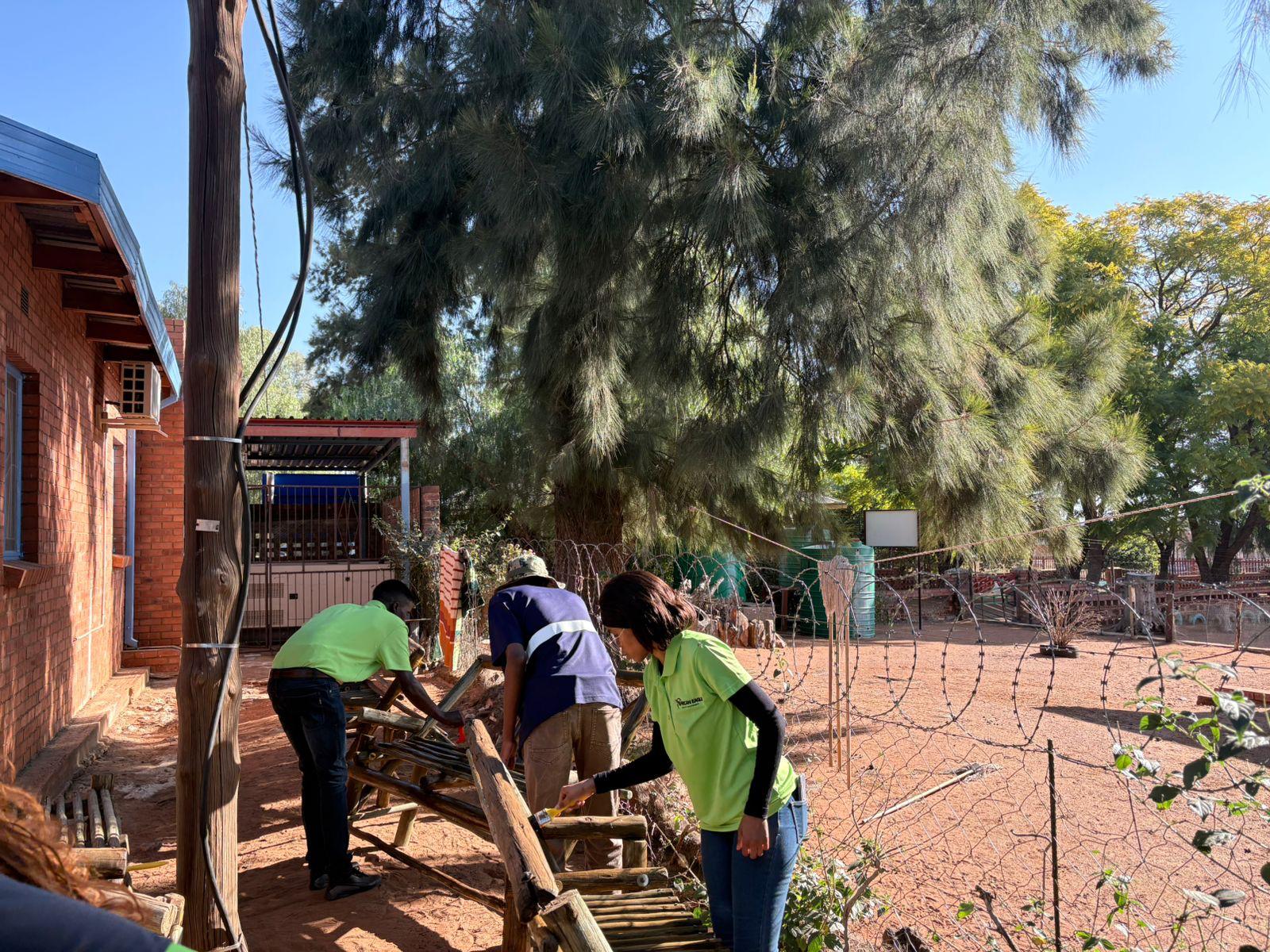 African Eagle employees carrying out maintenance work during Mandela Day